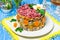 Multilayer festive salad with beef and carrots