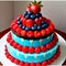 A multilayered red, blue and white cake with a lot of berries, AI generated