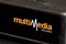 Multimedia Polska logo on TV cable decoder. Multimedia is broadband cable operator