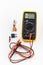 Multimeter for a measurement of a voltage, current and resistance with cables. Electrical multimeter to check the resistance on a