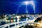 Multiple electric lightning strikes over river in Brisbane