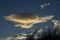 Multiple exposure composite of a zeppelin shaped cloud