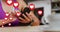 Multiple heart icons floating against mid section of caucasian woman using smartphone