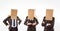 Multiple image of businessmen with cardboard boxes covering head