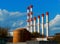 Multiple industrial chimneys industrial ecology background