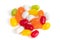 Multiple jelly bean candy sweets on white background