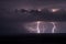 Multiple lightning bolts during a thunderstorm over the sea