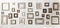 Multiple many blank small picture frames on white wall