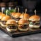Multiple mini-burgers on a wooden board