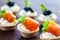 Multiple mini seafood pastry tartlets.