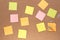 Multiple multi-coloured post it notes