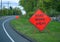 Multiple orange Road Work Ahead signs