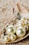 Multiple pearls in oyster sea shell on sand