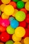 Multiple plastic coloured balls as background