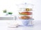 Multiple purpose food steaming pot