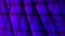 Multiple spinning squares forming a blue and purple mosaic. Seamless loop.