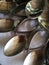 Multiple stainless steel spoons arranged on the table