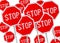 Multiple stop sign against white background