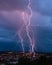 Multiple thunderbolts above the city