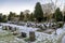 Multiple tombstones and snow covered ground in scenic Lagard cemetery during winter season, Stavanger