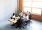 Multiracial Business Team Working Sitting At Desk In Office, High-Angle