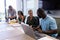 Multiracial businesswomen and businessmen planning strategy during meeting boardroom at workplace