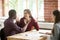 Multiracial couple excited by fantastic real estate mortgage inv