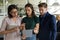 Multiracial coworkers brainstorm discussing ideas in office