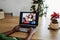 Multiracial family doing video call during Christmas time - Focus on right hand
