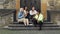 Multiracial Female Teens Having Lunch Outdoors