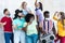 Multiracial friends dancing to music with boombox stereo outdoor with masks under chins - Focus on black man