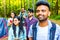 Multiracial pakistanian happy friends at picnic camping park