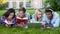 Multiracial students preparing for lessons, talking with each other, education