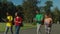 Multiracial students walking to class on campus