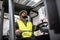 Multiracial warehouse worker driving forklift. Warehouse worker preparing products for shipmennt, delivery, checking