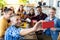 Multiracial young people taking selfie group portrait while having breakfast