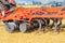 Multirow disc harrow for field work as a hitch on an agricultural tractor