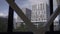 Multistory commercial buildings under sky with light clouds