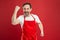 Multitasking is chefs game. Cook with beard and mustache red background. Man mature cook posing cooking apron. Fine