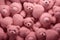 A multitude of pink teddy bears gathered together in a large group, creating an adorable and charming scene., A soft and plushy