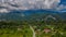 Mulu village with road, tropical forest and mountains near Gunung Mulu national park. Borneo. Sarawak.