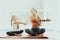 Mum And Daughter Yoga Training. Lotus Position.
