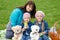 Mum embraces daughters on a picnic
