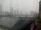 Mumbai city view from top floor during rainy season drop on the glass