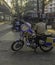 Mumbai policeman sitting on his motorcycle parked on the roadside