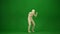 A mummy wrapped in bandages poses in a scary pose. Green screen isolated chroma key. Mock up, workspace, advertisement