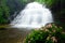 Mun Daeng waterfall and rare flower on tropical