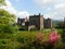 The Muncaster Castle complex in the gardens on spring day