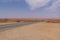 Mundi Mundi Lookout long road view with red dirt and blue sky, itâ€™s a perfect spot.