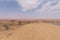 Mundi Mundi Lookout long road view with red dirt and blue sky, itâ€™s a perfect spot.